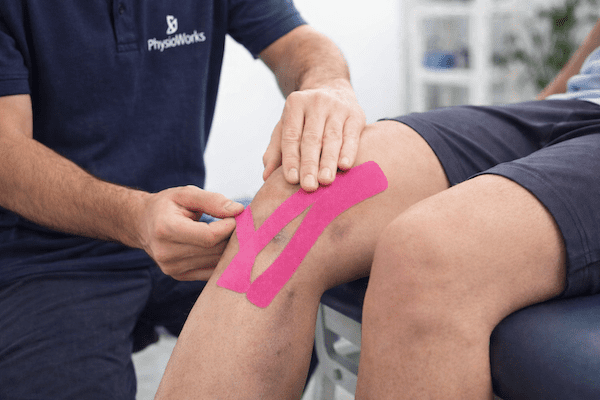 Kinesiology tape for swelling and bruising applied around the patella